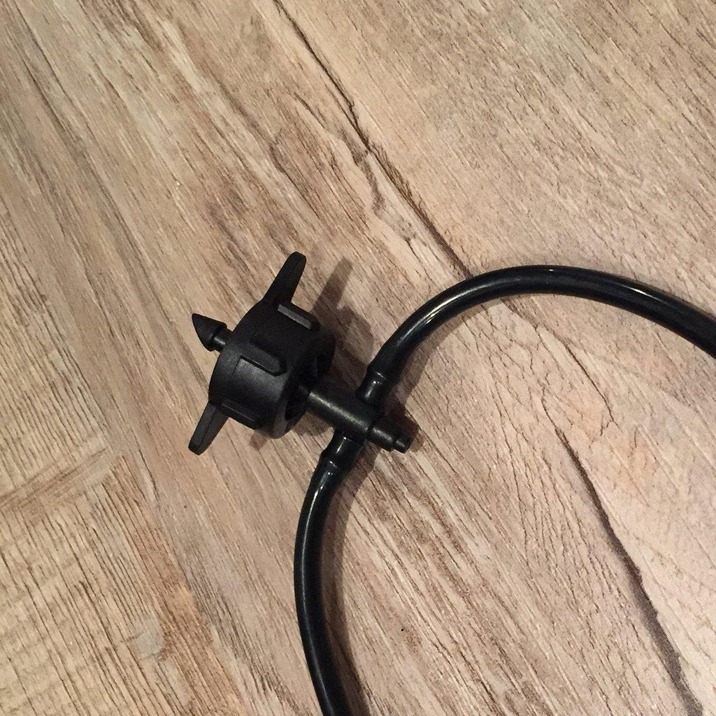 Emitter is easy insertion into irrigation feed line